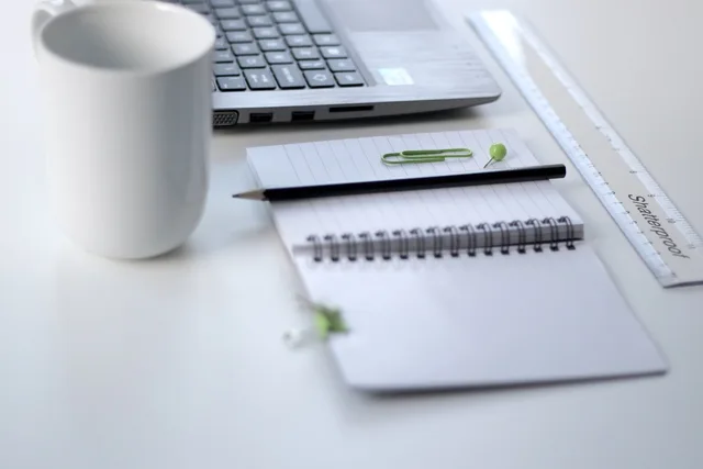 white, table, ruler, notebook, pencil, pin, mug, cup, laptop, school, education, aesthetics, blue computer, blue school, blue laptop, blue education, blue table, blue cup. Five local SEO 2027 trends explained for England buyers and agencies