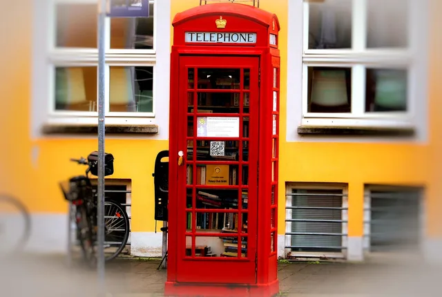 phone booth, british, bookcase, public bookcase, borrow a book. What local citation building means for UK businesses and which sources to claim first